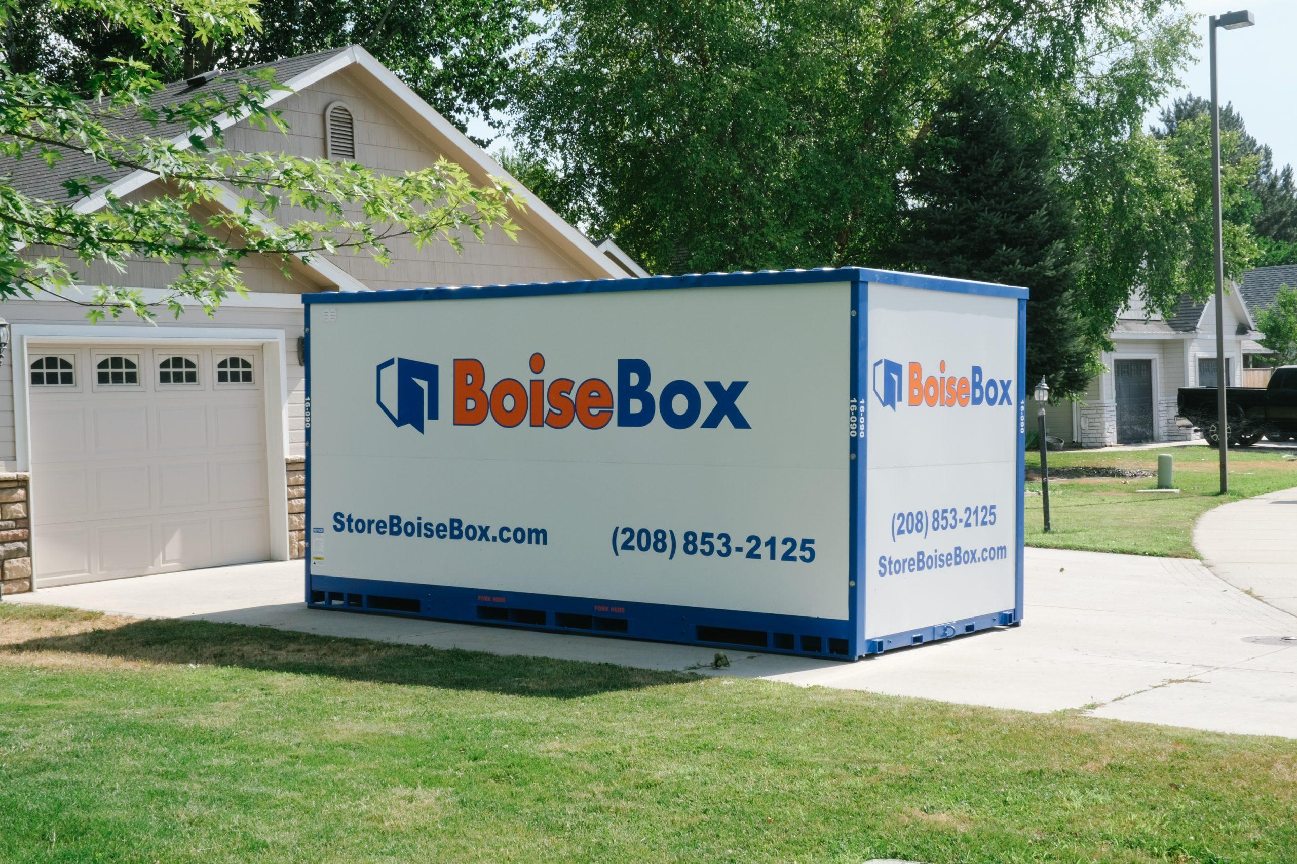 BoiseBox portable storage container placed at a home during a garage project